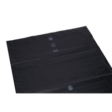 A large, flat DEISS 95007 black garbage bag sheet from EMIL DEISS KG (570+400x1150x0.1 mm) shows recycling and plastic ID symbols with the number 65 in white - ideal for waste disposal on a plain white background. The box contains 120 bags.