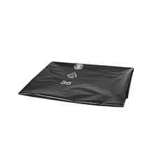 The folded black plastic garbage bag DEISS 95055 (900x1100mm, Type 70, black) from EMIL DEISS KG with recycling material symbols and a white "36" offers a practical packaging solution for the carton or shipping box.