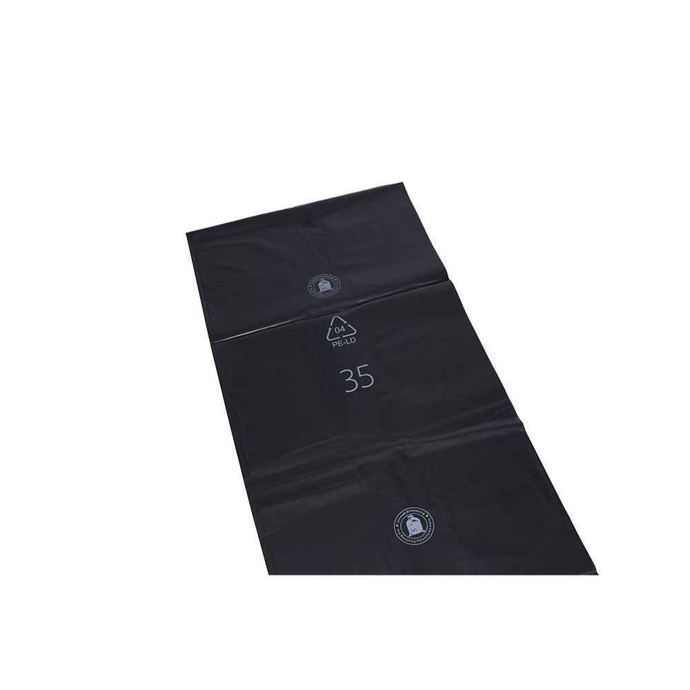 Flat, rectangular DEISS 95076 garbage bags from EMIL DEISS KG (GmbH + Co.) made of sturdy black plastic, printed with white symbols and the number 35, lie on a white background - ideal for commercial disposal.