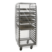 A metal bakery shelf with several compartments is covered by a transparent DEISS 99261 (950+750x1800x0.03 mm) trolley cover from EMIL DEISS KG, which highlights food safety in a simple white.