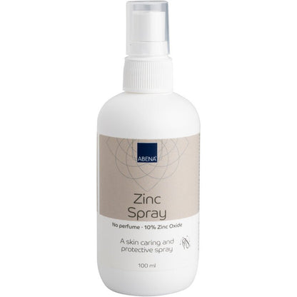 A white 100 ml plastic spray bottle labeled "Zinc Spray, 10% Zinc Oxide" from Abena Re-Seller GmbH. The label states "Without Perfume" and promotes skin care and protection. Available in a pack of 6. Ideal for gentle application.