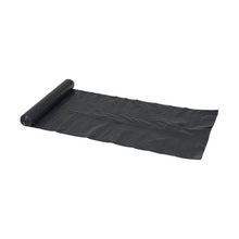A partially unrolled Abena Re-Seller GmbH garbage bag 120 L, 700x1100 mm, 45 my LDPE, Black (roll with 10 bags) lies flat on a white surface, with the rest of the roll still neatly rolled up at one end.
