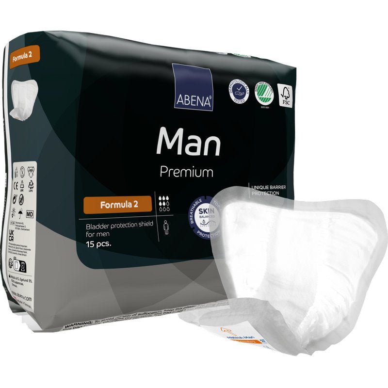 Pictured is a pack of ABENA Man Formula Premium from Abena Re-Seller GmbH with a sign in the foreground. The pack contains 15 pieces and highlights skin-friendly and barrier-protective properties.