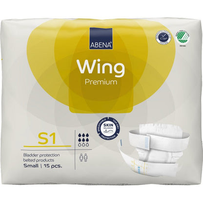 A 15-pack of ABENA Wing Premium by Abena Re-Seller GmbH, size Small, comes in a predominantly white packaging with yellow accents, highlighting protection and comfort, and a product image on the front.