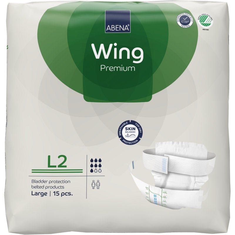Packaging of the ABENA Wing Premium by Abena Re-Seller GmbH, size Large, 15 pieces. The white-green packaging shows product details, a diaper image, and emphasizes "protection and comfort" for reliable bladder protection.