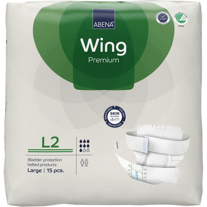 Packaging of the ABENA Wing Premium by Abena Re-Seller GmbH, size Large, 15 pieces. The white-green packaging shows product details, a diaper image, and emphasizes "protection and comfort" for reliable bladder protection.