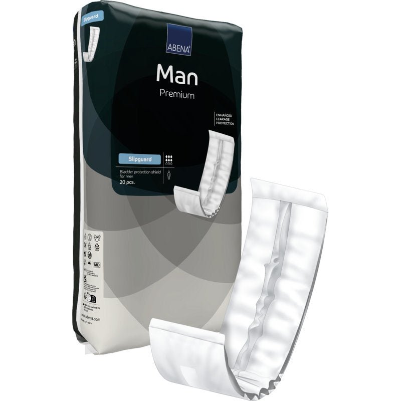 The image shows a package of "ABENA Man Slipguard, Premium" from Abena Re-Seller GmbH with an opened absorbent pad on the front, displaying its internal structure and shape. The package contains 20 incontinence slips for men.
