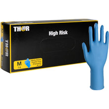 A medium-sized box labeled "Thor High Risk Nitrile Gloves, Blue, 30 cm" from Abena Re-Seller GmbH stands upright. The powder-free gloves are disposable and provide protection against chemicals.