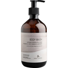 The ENA Living Body Wash, 500 ml from Abena Re-Seller GmbH (carton with 8 packs), provides moisturizing care with essential oils from cedarwood, orange, and lavender. The white design emphasizes the gentle body wash lotion.