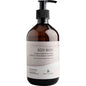 The ENA Living Body Wash, 500 ml from Abena Re-Seller GmbH (carton with 8 packs), provides moisturizing care with essential oils from cedarwood, orange, and lavender. The white design emphasizes the gentle body wash lotion.