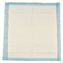 A 6-ply, 60x60 cm ABENA Tissue disposable pad from Abena Re-Seller GmbH, with a blue border and white center, is shown lying flat and has visible creases; it is sold in packs of 25.
