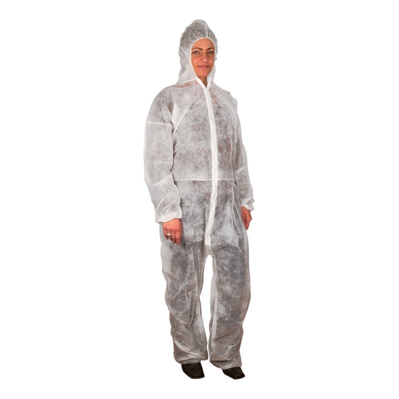 An adult wears the disposable overall, Nonwoven/PP, White from Abena Re-Seller GmbH - a white disposable overall with a hood, front zipper, and elastic cuffs at the wrists and ankles - in front of a simple white background.