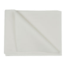 A disposable towel, airlaid, white from Abena Re-Seller GmbH lies on a white background, with one corner folded up to show the structure and thickness of the high-quality disposable fabric.