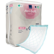 A package of Abena Re-Seller GmbH disposable pads, Abri-Soft Superdry, blue, 40x60 cm, 60 pieces—ideal for care facilities. A pad with a white absorbent surface and blue edges is visible outside the package.
