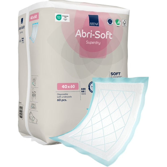 A package of Abena Re-Seller GmbH disposable pads, Abri-Soft Superdry, blue, 40x60 cm, 60 pieces—ideal for care facilities. A pad with a white absorbent surface and blue edges is visible outside the package.