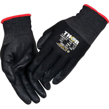 A pair of black Thor Flex winter gloves with a textured grip, red-trimmed cuffs, and printed safety certifications on the back from Abena Re-Seller GmbH.