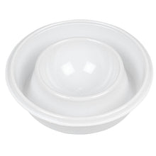 A white plastic egg separator efficiently separates egg whites from yolks—ideal when paired with the white egg cup (pack of 100) from Abena Re-Seller GmbH to create a complete breakfast set.