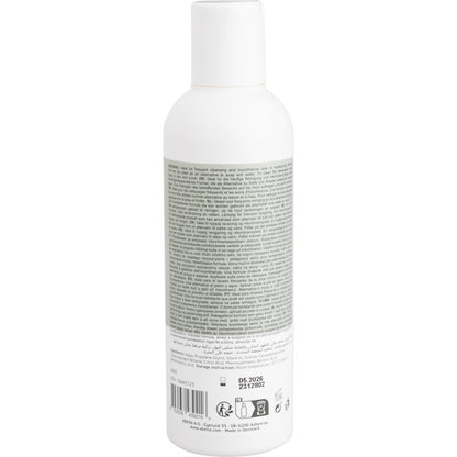 White plastic bottle with white cap, seen from the back. The label contains information and instructions about Abena Re-Seller GmbH hair and body shampoo "Washing without Water", 200 ml | Box (6 packs), as well as recycling and barcode symbols.