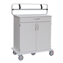 A white medical cart with a flat plate, drawer, cabinet, and wheels features a metal rail and two black straps to securely hold the Novocal paper roll dispenser (max. roll width 100 mm) from Novocal. The cart is placed against a plain background.