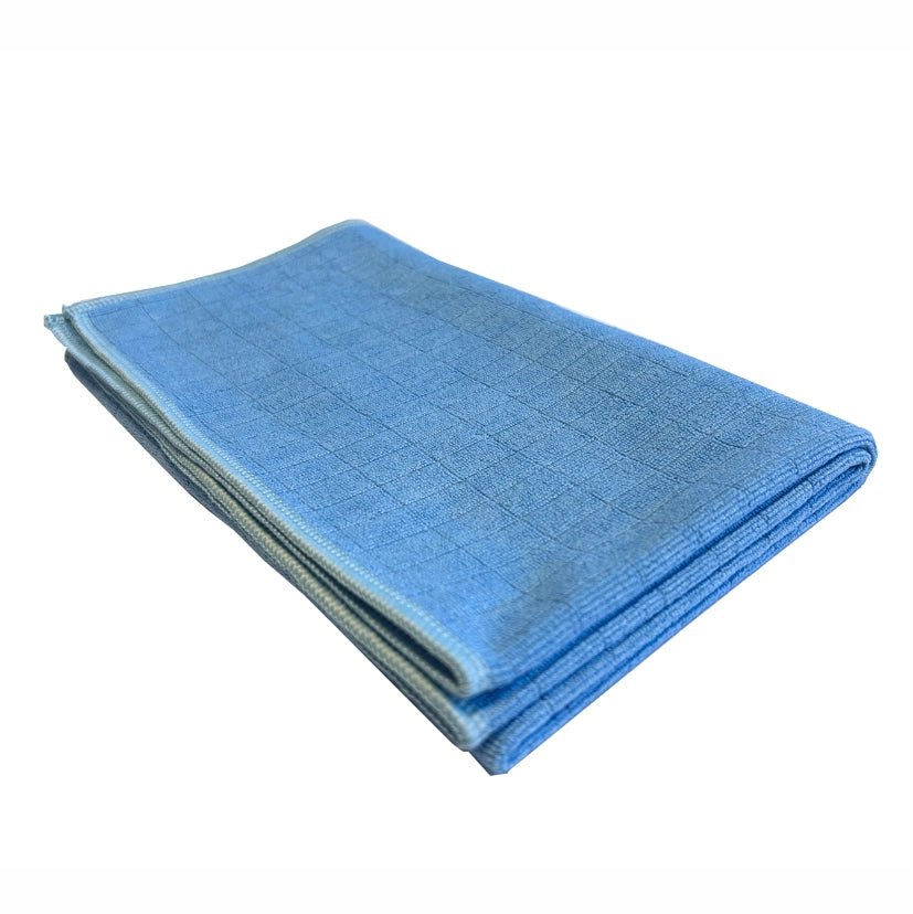 A neatly folded Arcora Floor-Clean microfiber floor cloth from Arcora International GmbH, with a blue grid pattern, ideal for floor cleaning. Sold in a pack of 10 pieces and displayed on a simple white background.