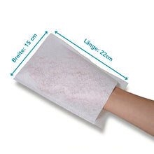 A hand is shown inside an Altrucare disposable wash glove CuraSOFT Basic (60g) from Altruan. Blue arrows indicate its size: 15 cm wide, 22 cm long. The background is plain white. The package contains 50 pieces.