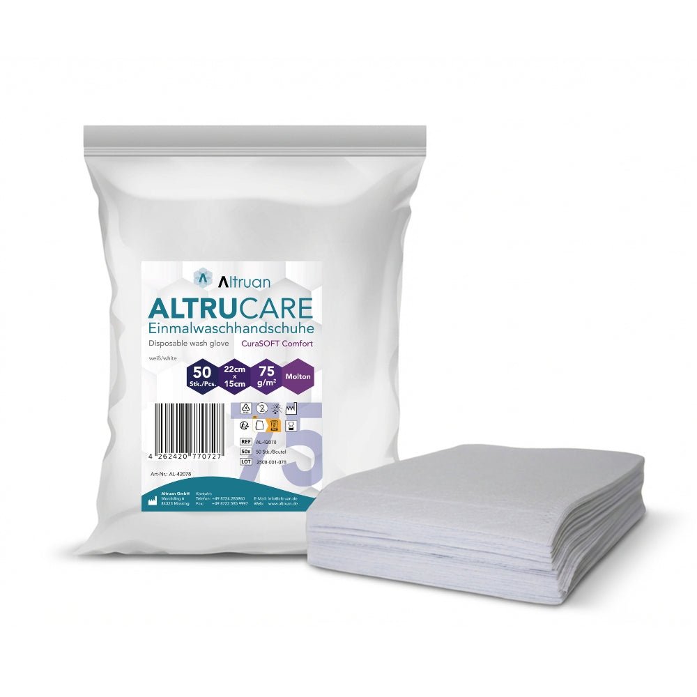 A pack of Altruan Altrucare disposable wash gloves CuraSOFT Comfort (75 g) with 50 disposable wash gloves is pictured next to a stack of folded gloves; the pack is 22 x 15 cm in size.