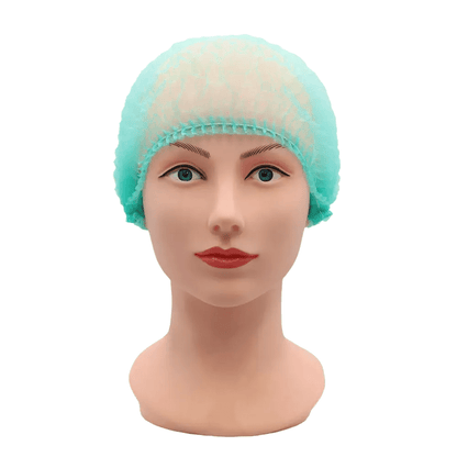 The head of a mannequin is adorned with a light blue AMPri ECO-PLUS clip cap, ideal for use in the medical field. It shows a neutral expression against a plain white background.