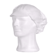 A doll's head in white is adorned with an AMPri MED-COMFORT beret cap, offered by AMPri Handelsgesellschaft mbH in white and blue. This disposable product provides hygienic protection, with the hairnet covering the entire head area cleanly and effectively. The doll is slightly facing left, with facial features not strongly emphasized.