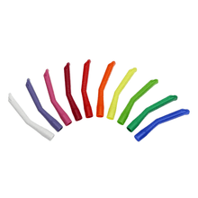 A semicircular arrangement of ten colorful AMPri MED-COMFORT dental suction cannulas for adults, made from polypropylene by AMPri Handelsgesellschaft mbH. Each angled plastic tip features a vibrant color: White, Purple, Pink, Red, Orange, Yellow, Light Green, Green, Blue Green, and Navy Blue.