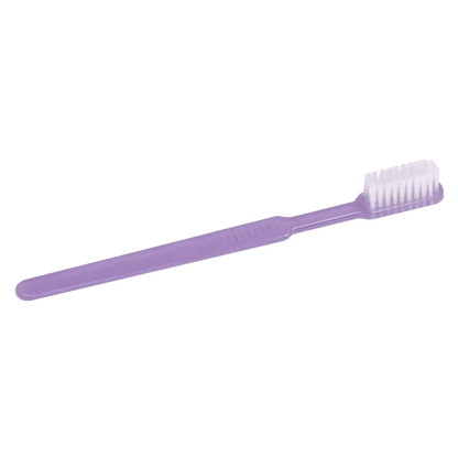 Against a white background, a purple AMPri MED-COMFORT Dental PS disposable toothbrush with a long, straight handle and white bristles is visible – ideal for dental care while traveling.