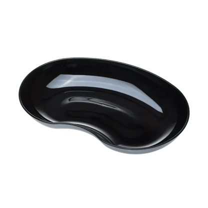 A black, kidney-shaped tray from the AMPri MED-COMFORT plastic kidney bowl 24 cm 600 ml series by AMPri Handelsgesellschaft mbH has a shiny surface. Its curved design makes it suitable for various purposes, such as storing small items or serving food, while its interior surface reflects light and highlights its shiny texture.