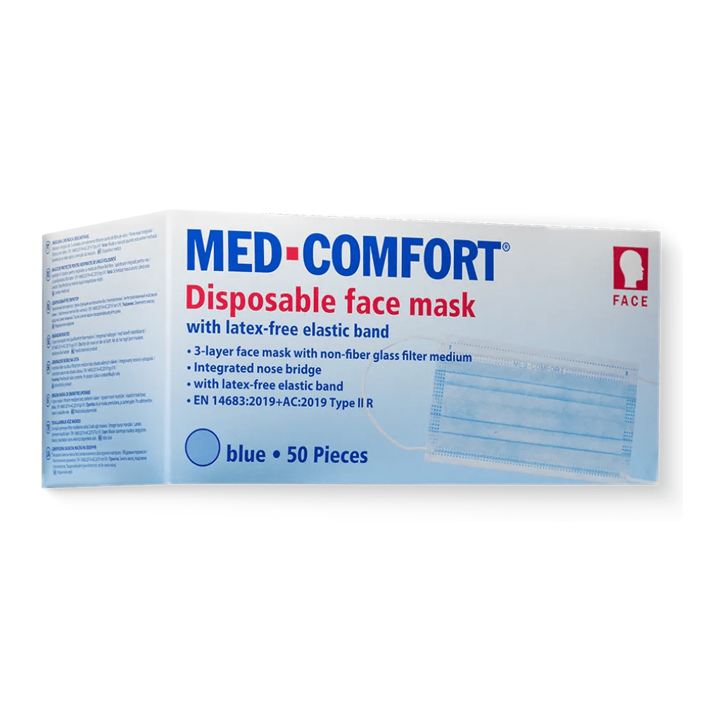 Picture of a box of AMPri MED-COMFORT surgical mask Type IIR, various colors. The box is predominantly white with blue text and details. It contains 50 pieces and features a 3-layer mask with latex-free elastic band, integrated nose bridge, and Type-IIR certification by AMPri Handelsgesellschaft mbH.