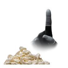 A gloved hand with a single raised finger, wrapped in an AMPri MED-COMFORT Latex Finger Cot from AMPri Handelsgesellschaft mbH, rests over a pile of crumpled beige finger cots on a white background. The pack contains 100 pieces in various sizes.