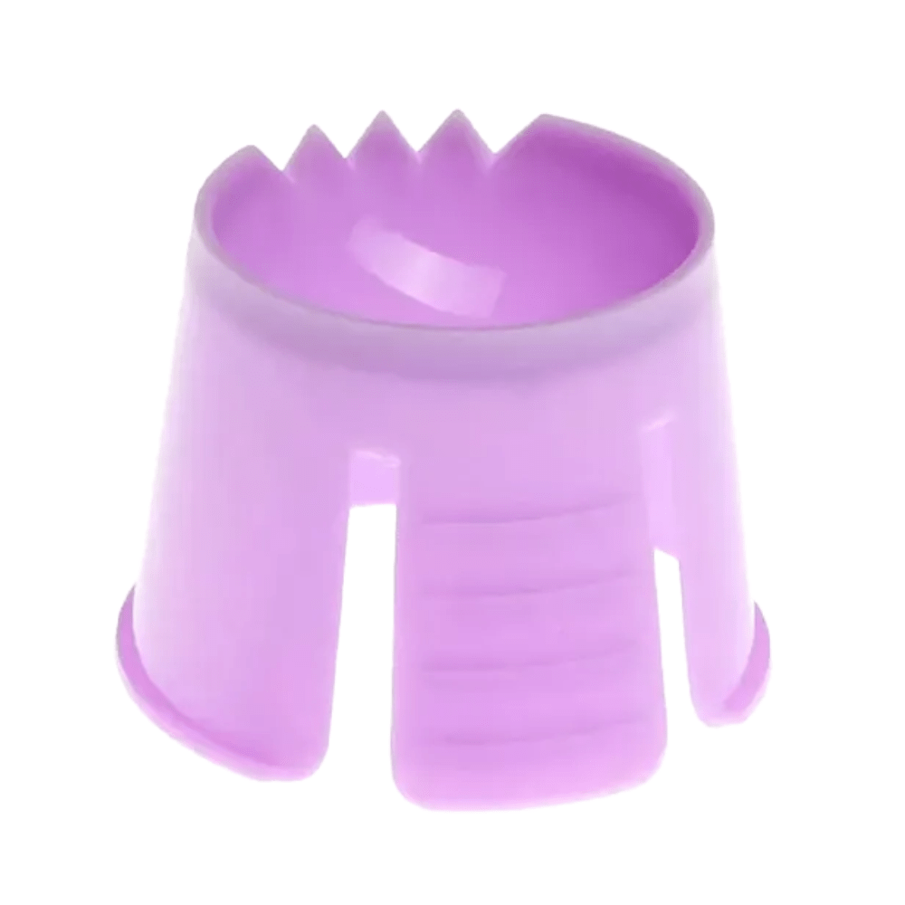 A purple, cylindrical plastic object made of polypropylene with a serrated edge at the top and open sides. It serves as a tool or holder, possibly for organizing or gripping items, similar to the AMPri PP disposable dappen dish, which is used for portioning and mixing dental materials.