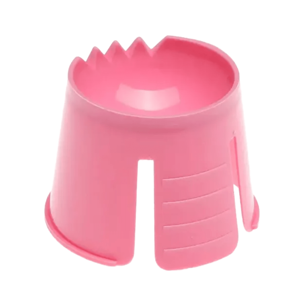 The AMPri PP disposable dappen dish from AMPri Handelsgesellschaft mbH is a pink plastic container made of durable polypropylene. It features a stable base and has small grooves inside with vertical slots on the sides, which likely serve for gripping or decorative purposes.