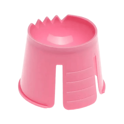 The AMPri PP disposable dappen dish from AMPri Handelsgesellschaft mbH is a pink plastic container made of durable polypropylene. It features a stable base and has small grooves inside with vertical slots on the sides, which likely serve for gripping or decorative purposes.