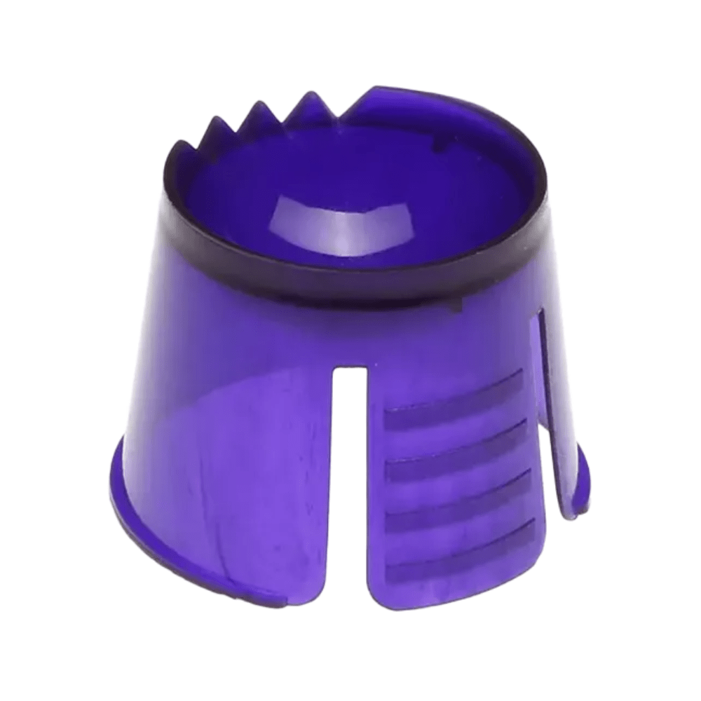 A cylindrical blue attachment made of polypropylene with notched edges is intended for use as a component in dental materials. It is slotted on one side and likely intended for dosing or mixing purposes. Distributed under the product name “AMPri PP disposable dappen dish for portioning and mixing dental materials 1000 pcs.” by AMPri Handelsgesellschaft mbH.