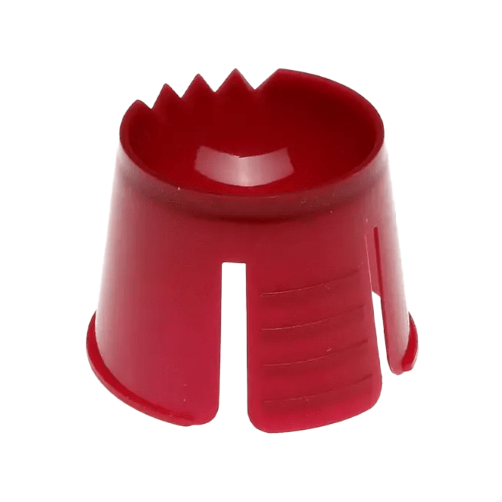 The product is a red plastic container with a rounded top, saw-like edges, and side slots made of polypropylene. It is presumably the AMPri PP dappen dish for portioning and mixing dental materials by AMPri Handelsgesellschaft mbH.