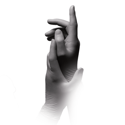 A pair of hands wearing AMPri STYLE PLATINUM powder-free nitrile gloves by MED-COMFORT, silver-gray by AMPri Handelsgesellschaft mbH, are positioned against a white background. The right hand is slightly raised, with fingers bent upwards, while the left hand lies lower and is partially obscured by the right hand, highlighting its powder-free design.