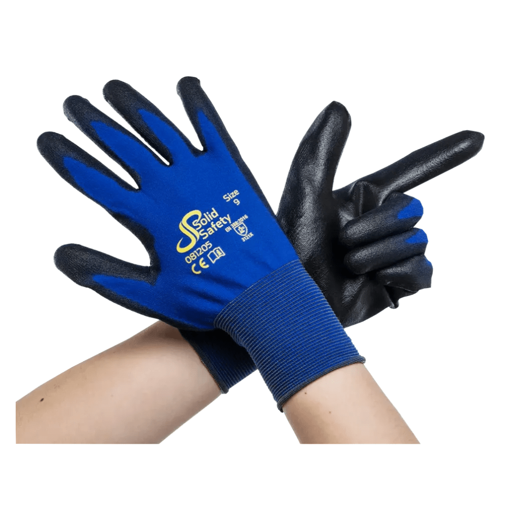 A pair of crossed arms with ultra-light blue and black safety gloves AMPri SolidSafety Tough Fine Touch exudes premium quality. The open palm of the left glove faces forward, while the right forms the shape of a finger gun. These gloves proudly display the logo of AMPri Handelsgesellschaft mbH and size information from XS to XXL, ensuring reliable performance.