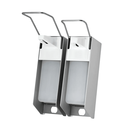 Displayed are two AMPri wall dispensers for 500 ml disinfectant and soap, with a stainless steel housing and a white plastic dispenser. Each is equipped with a long lever for hygienic dispensing. They are placed side by side against a plain white background.