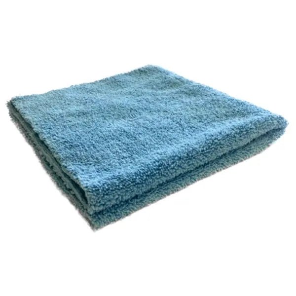 A folded Arcora Polish-Line High-Pile Microfiber Cloth - Edgeless (Pack of 10) from Arcora International GmbH is seen on a white background - ideal for streak-free, gentle cleaning thanks to its edgeless design.