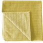 A folded yellow Arcora Scrub & Clean 2N1 microfiber cloth (40x40 cm) from Arcora International GmbH, with a textured surface and folded corner, perfect as a cleaning cloth for all surfaces.