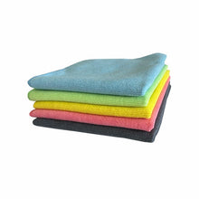 A stack of five Arcora SOFT-LINE MICROFIBER CLOTHS 40 x 40 cm from Arcora International GmbH in blue, green, yellow, pink, and black lies on white. These durable cloths ensure effective cleanliness with every use.