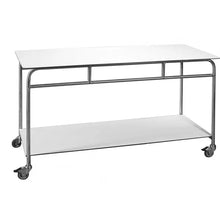 The Novocal work and side table features a stainless steel frame and a white solid core top. It is easy to transport and store, and with its robust design and wheels, it is ideal as a work table.