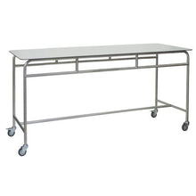 The Novocal work and storage table features a white solid core worktop, a sturdy stainless steel frame, and four swivel casters for flexible use. Open base without shelves - ideal as a work table in the office.