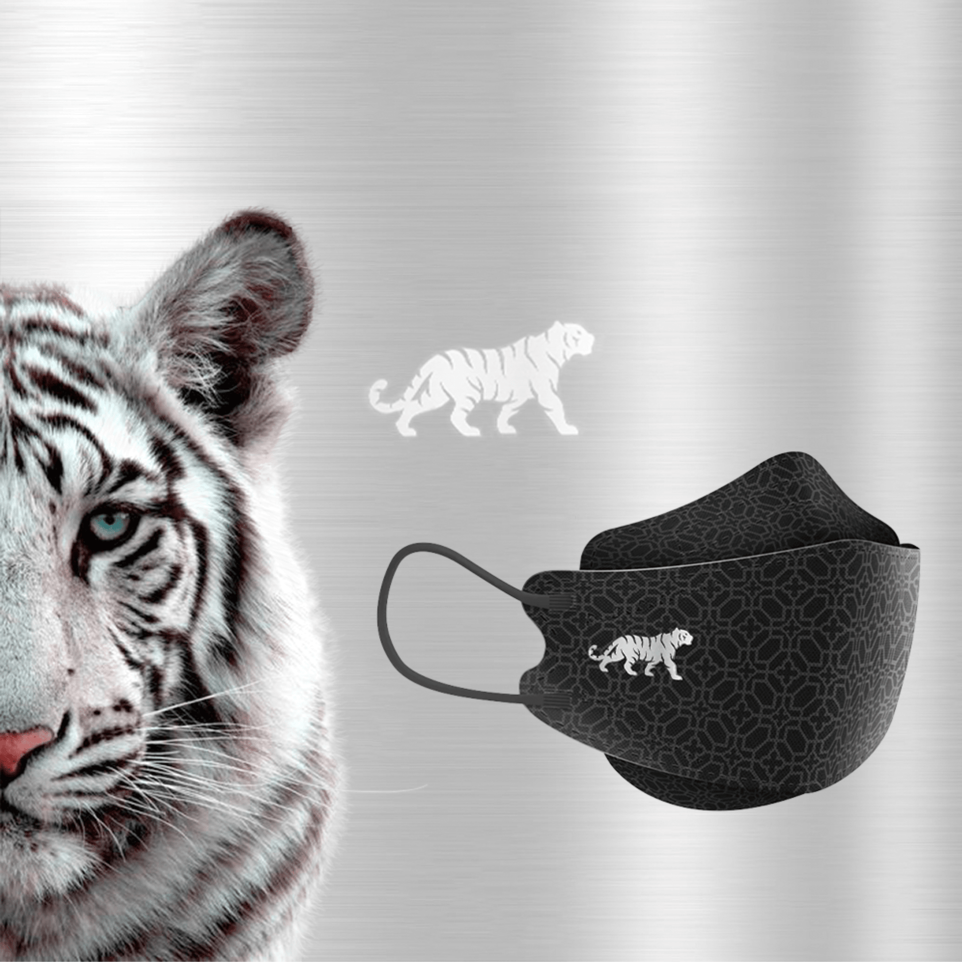 The image shows a close-up of a white tiger with distinctive stripes. Next to the tiger is an Altruan designer face mask that meets the FFP2 standard and features a matching tiger design. The background is a subtly textured metallic silver.