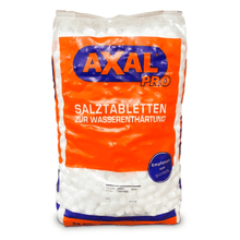 A pack of AXAL PRO TABS regenerating salt, special salt tablets for water softening. The packaging is orange and white and bears the text "SPECIAL SALT FOR WATER SOFTENING." A blue circle on the packaging indicates that the product is recommended for home use. It is manufactured by K+S Minerals and Agriculture GmbH.