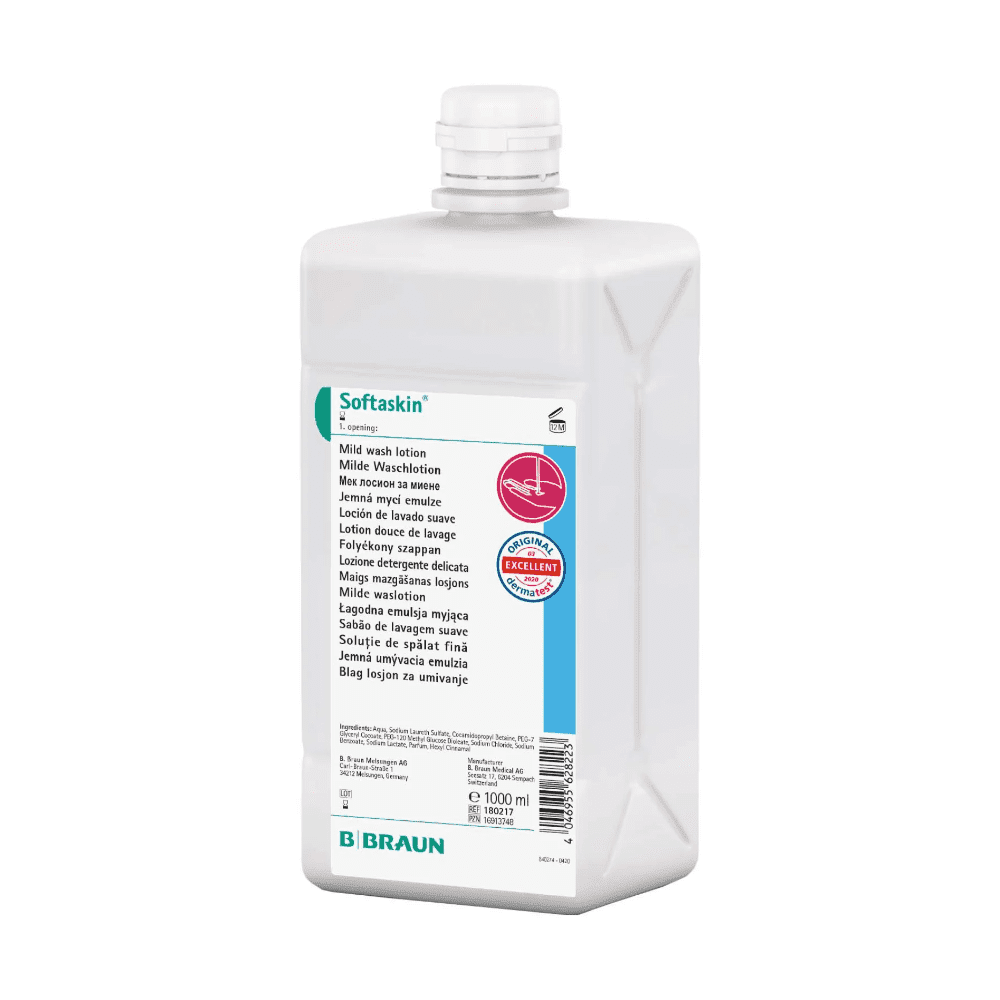 A rectangular white plastic bottle from B. Braun Deutschland GmbH & Co. KG has a label on the front with the inscription "B. Braun Softaskin® Wash Lotion" in several languages. A red stamp marks the quality as "Excellent" and highlights the microplastic-free formula. The bottle with a screw cap has a capacity of 1000 ml.
