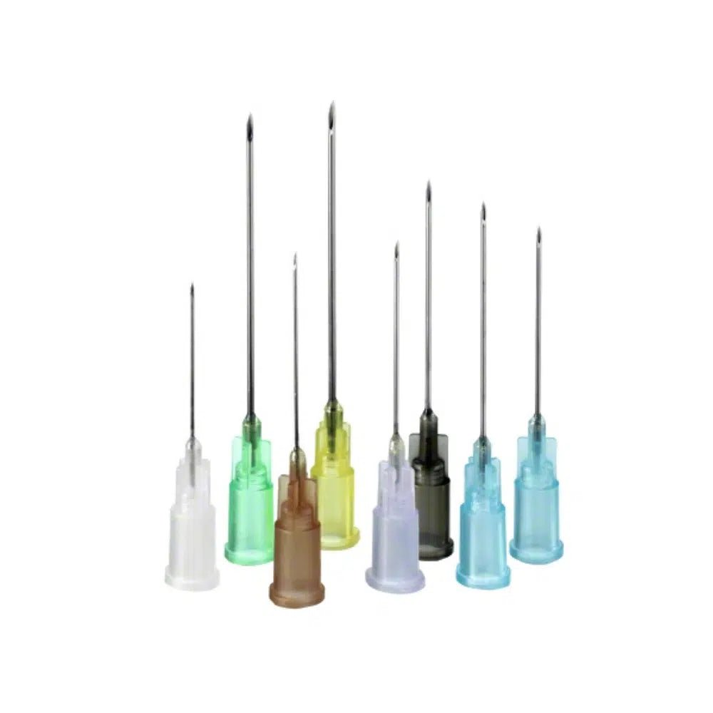 A set of nine B. Braun Sterican® standard cannula subcutaneous needles is presented vertically. They are equipped with transparent plastic sleeves in various colors such as white, green, and blue. They are made of chromium-nickel steel and are suitable for Luer-Lock systems. They are presented against a plain white background.